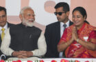 Bharatiya Janata Party leader Rekha Gupta, right, gestures as she talks to Indian Prime Minister Narendra Modi during her swearing in ceremony as Delhi state chief minister in New Delhi, India, Thursday, Feb. 20, 2025. (AP Photo/Manish Swarup)